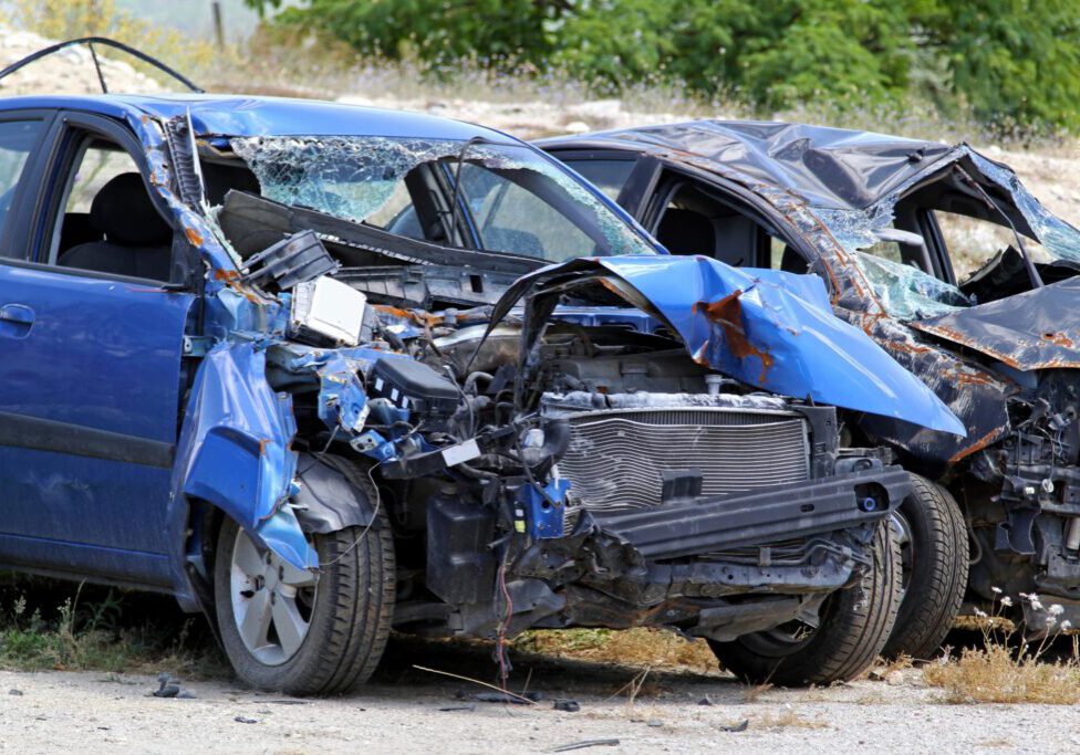 damaged automobile near the road