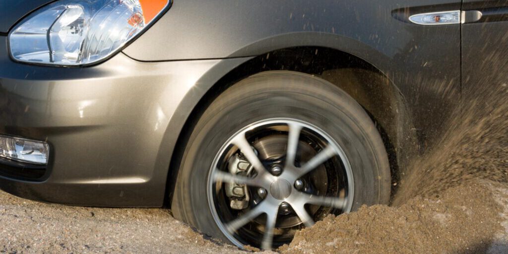 car stucked in the sand